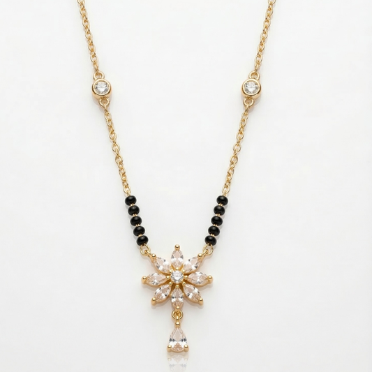 gold-plated mangalsutra black beaded chain American diamond