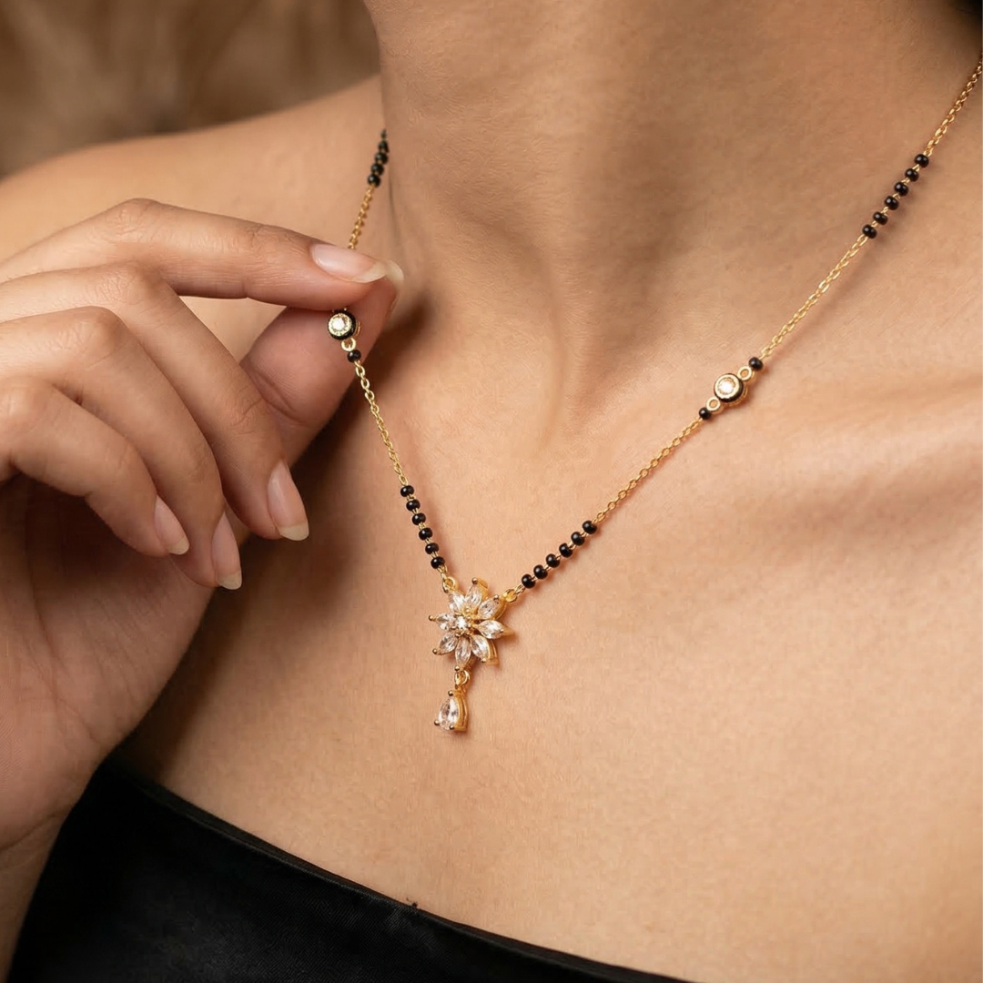 gold-plated mangalsutra black beaded chain American diamond | Tvayi