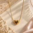 Amora 18K Gold Plated Heart Pendant Necklace on premium cream background – TVAYI