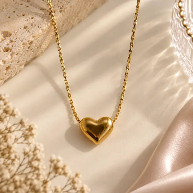 Amora 18K Gold Plated Heart Pendant Necklace on premium cream background – TVAYI