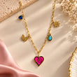Amour Pop 18K Gold Plated Multi Charm Necklace for Women on premium cream background – TVAYI