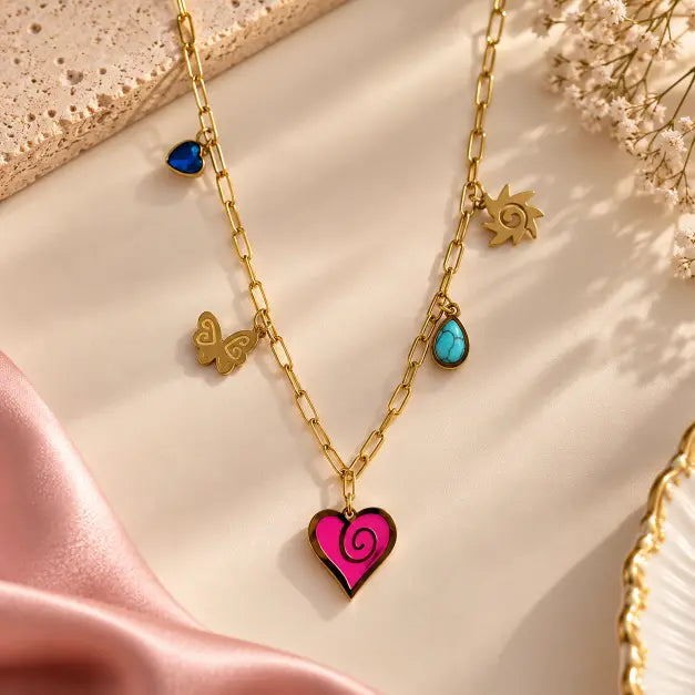 Amour Pop 18K Gold Plated Multi Charm Necklace for Women on premium cream background – TVAYI