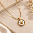 Amoura 18K Gold Plated Heart Pearl Pendant Necklace on premium cream background – TVAYI