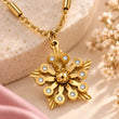 Close-up of Aurora Bloom floral pendant with sparkling stone details