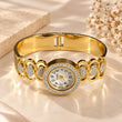 Celestia 18K Gold Plated Crystal Bracelet Watch for women on premium cream background – TVAYI