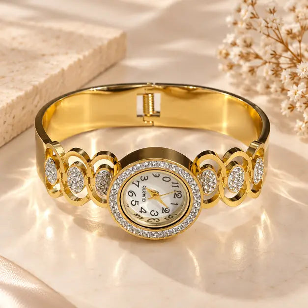 Celestia 18K Gold Plated Crystal Bracelet Watch for women on premium cream background – TVAYI