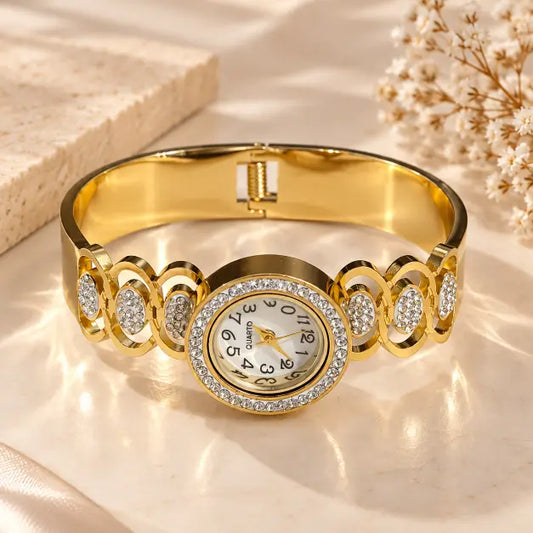 Celestia 18K Gold Plated Crystal Bracelet Watch for women on premium cream background – TVAYI