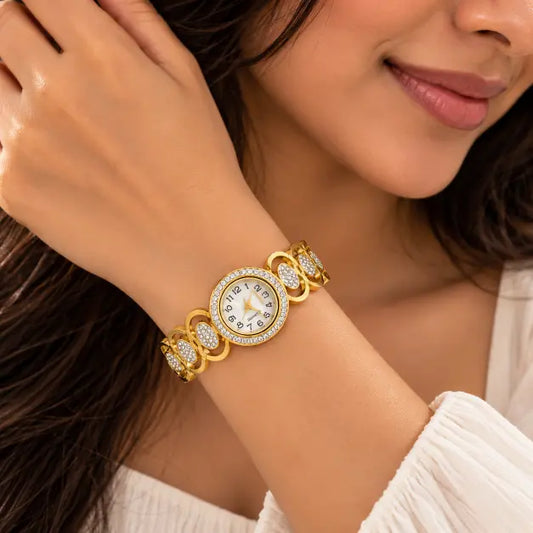Indian woman wearing Celestia 18K Gold Plated Crystal Bracelet Watch on wrist – TVAYI