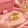 Close-up detail of Cerise Gold Plated Double Heart Charm Ring worn on finger – TVAYI