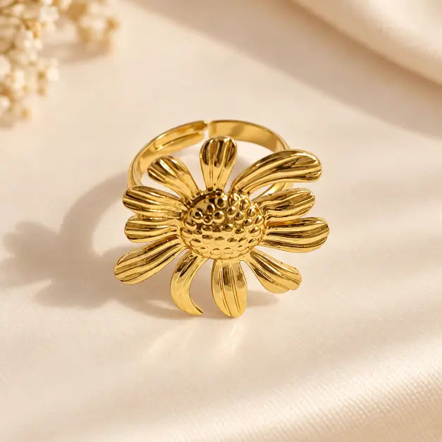 Elara Bloom 18K Gold Plated Floral Statement Ring on premium cream background – TVAYI
