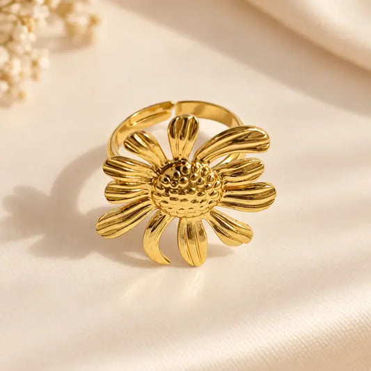 Elara Bloom 18K Gold Plated Floral Statement Ring on premium cream background – TVAYI