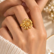Elara Bloom Gold Plated Flower Ring detailed view showing sculpted petals textured centre and adjustable fit – TVAYI