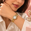 Woman wearing gold plated crystal bracelet watch on wrist – TVAYI