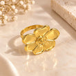 Fleuré 18K Gold Plated Flower Statement Ring on premium cream background – TVAYI