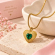 Slide 2:
Close-up of 18K gold plated green heart pendant necklace showing the detailed gold setting and green gemstone