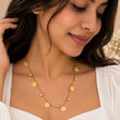 ndian woman wearing Happy Vibes 18K Gold Plated Smiley Charm Necklace – TVAYI