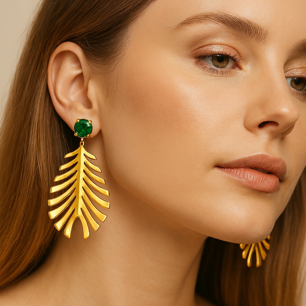 Palm leaf gold statement earrings with emerald green studs | Tvayi