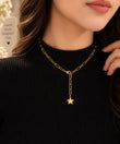 Woman wearing TVAYI Celeste Star Drop Necklace