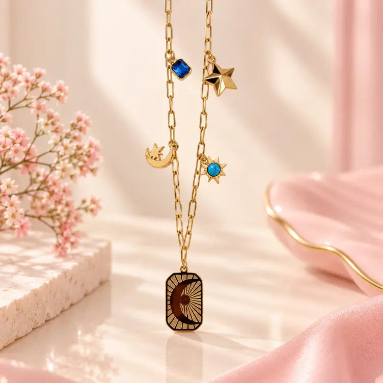 Close-up of 18K gold plated paperclip chain and plain gold star pendant